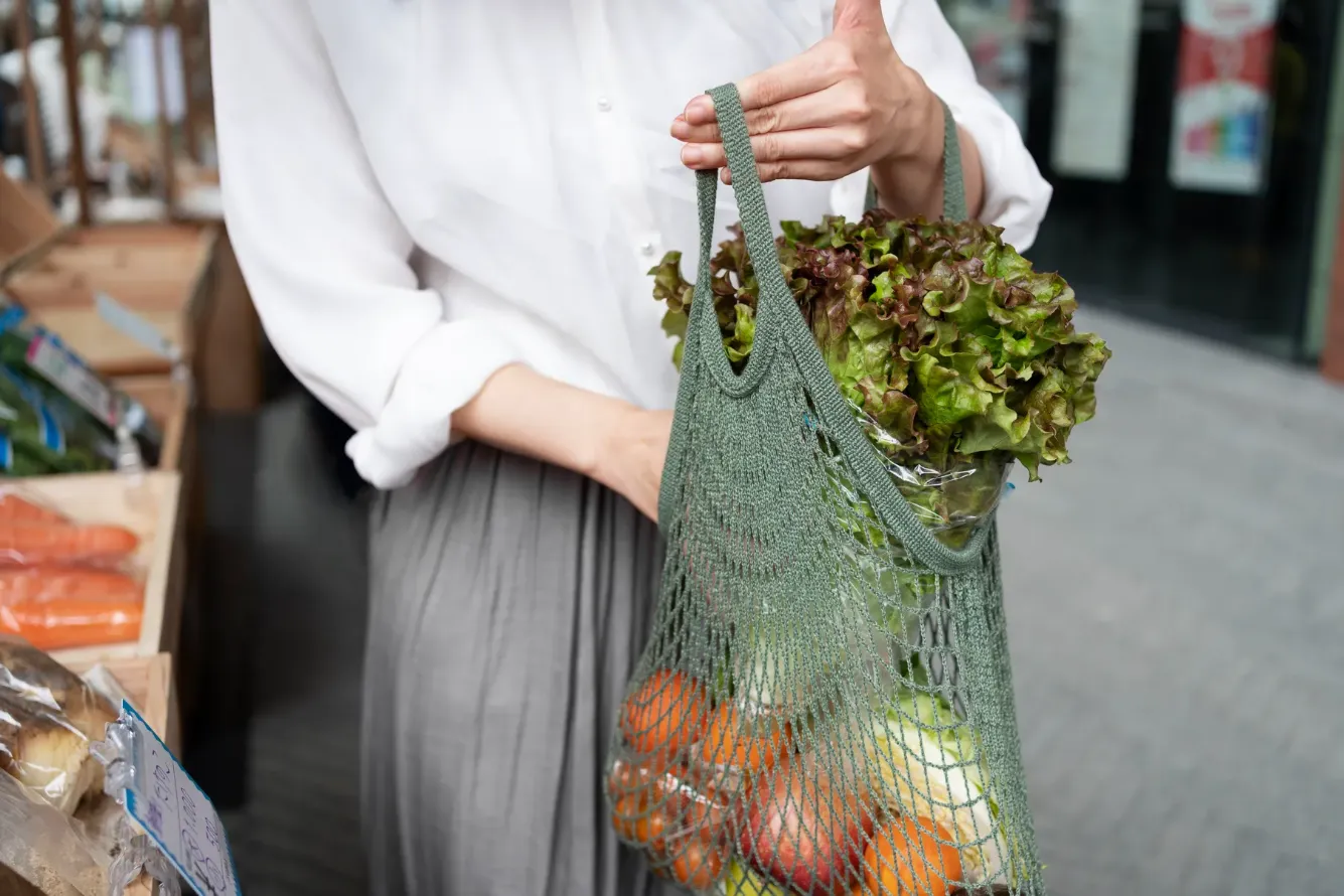 front-view-woman-carrying-groceries-tote-bag