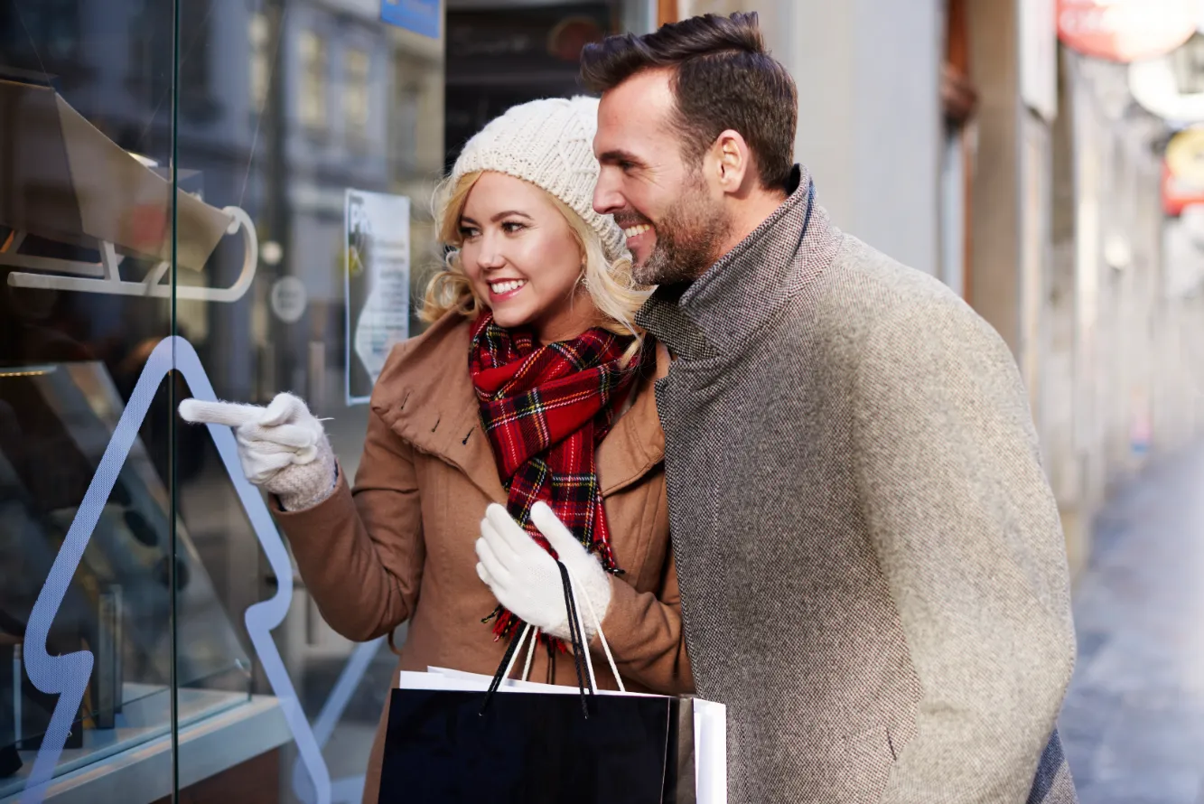 couple-looking-shopping-window